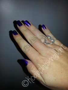 Opi_Tomorrow_never_dies_Hand_Ring